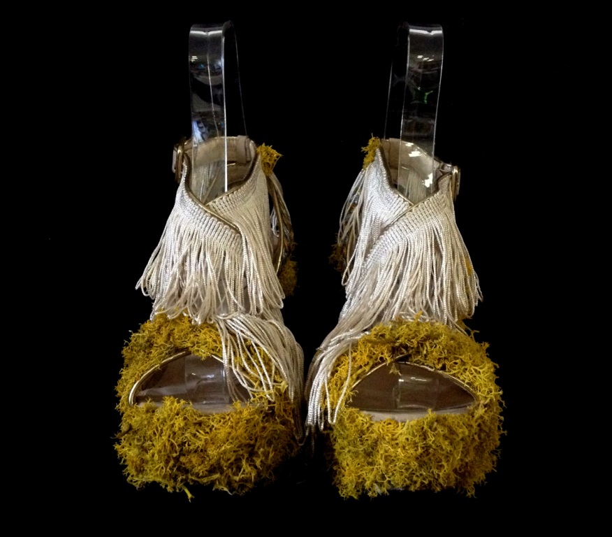 Bastardisation #23, 2014, fringes, golden decoration, Iceland's moss and spray paint on cross string sandal, size n38, unique piece